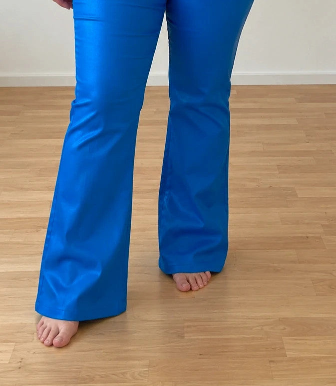 Bootcut blue bootcut trousers with shiny finish, fitted hips, and flared legs.