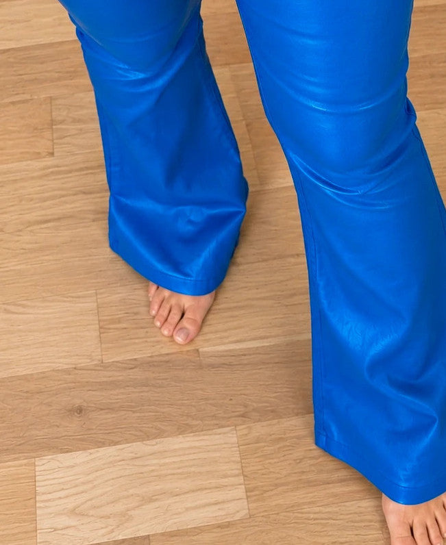 Bootcut blue bootcut trousers with shiny finish, fitted hips, and flared legs.